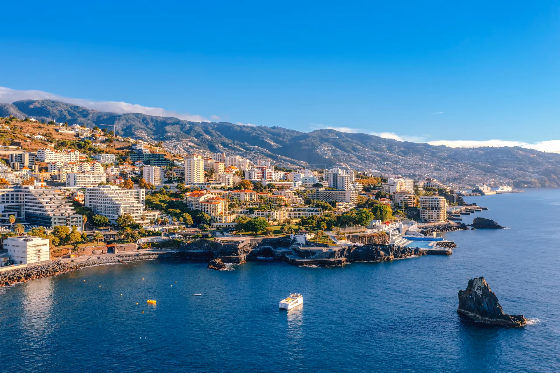 Funchal bay at dusk with the amphitheatre of hills behind the harbour