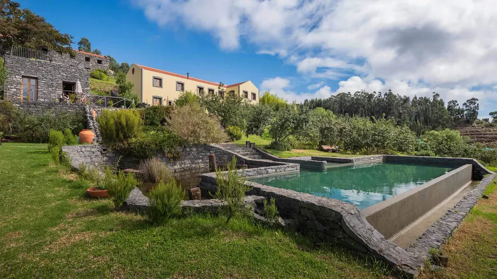 Traditional stone holiday houses and garden of Casas da Levada in Ponta do Pargo, western Madeira