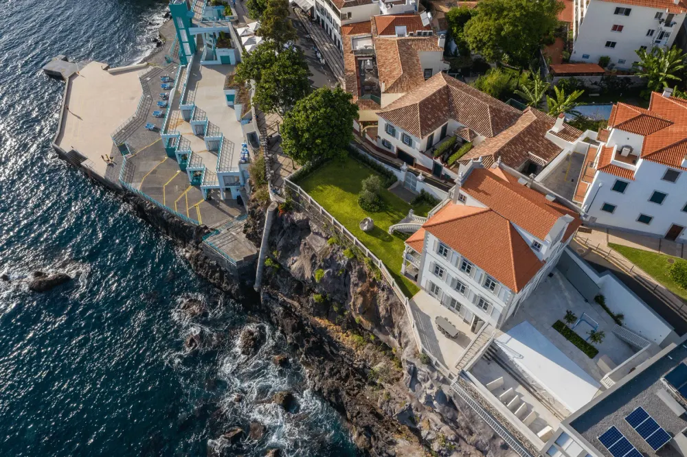 Sea-facing terrace of Luxury Barreirinha House above the Barreirinha lido, Funchal, Madeira