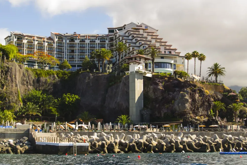Pool terrace on the promontory at The Cliff Bay hotel with direct Atlantic access, Funchal, Madeira